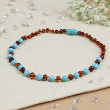 Baby Natura Barnsteen ketting baby/peuter Cognac/Turquoise Baby Natura Barnsteen ketting baby/peuter Cognac/Turquoise